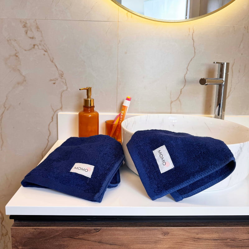 Blue bamboo washcloth in mood shot – soft, absorbent and sustainable