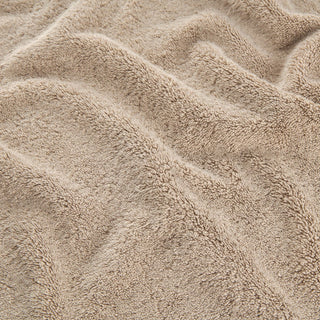 Beige bamboe handdoekenset met zacht textuurdetail van gezichts-, hand- en badhanddoeken